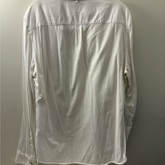 A light airy white comfortable button down top that is worth the wear - Picture 2 of 3